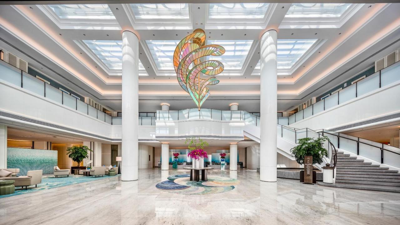 Xiamen International Seaside Hotel -Hotel Corridor Leads To The Stone Exhibition Hall Exterior photo