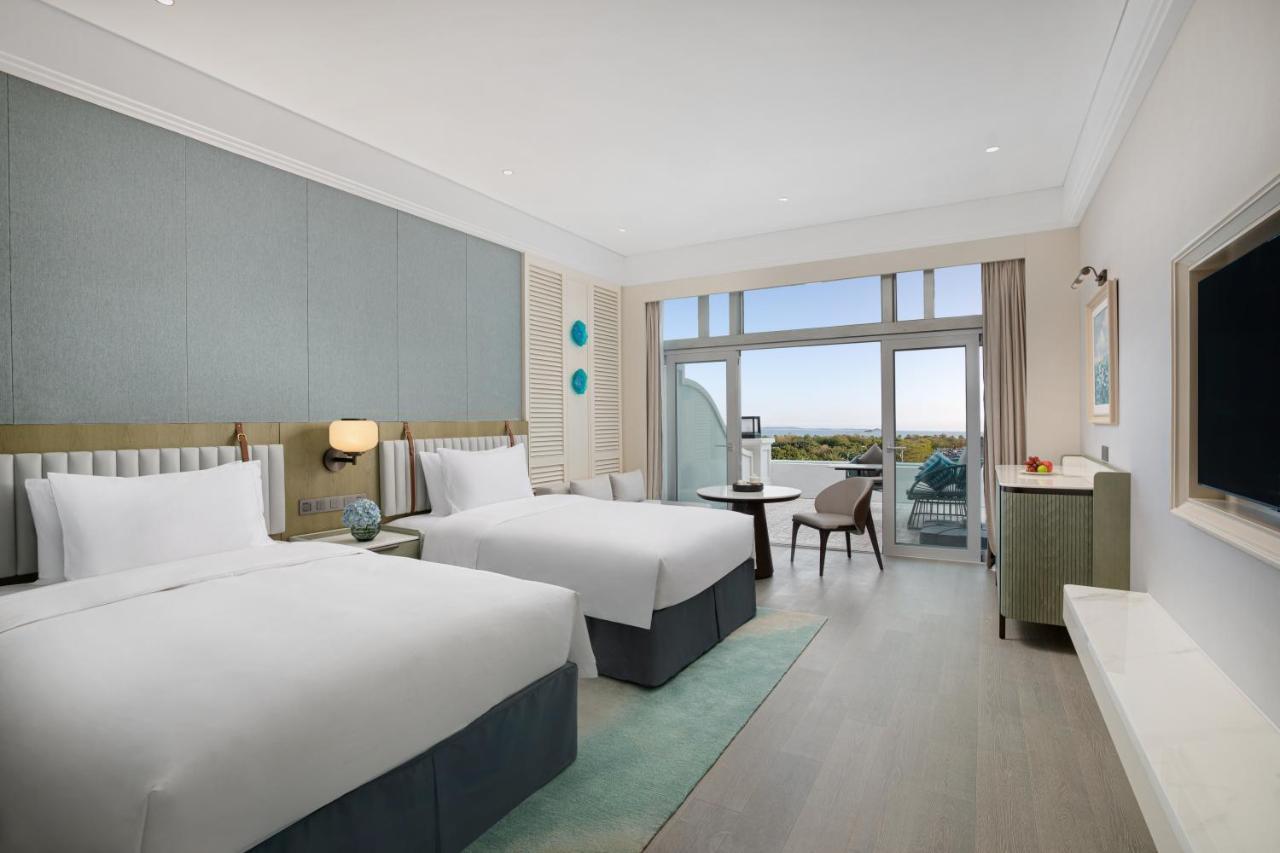 Xiamen International Seaside Hotel -Hotel Corridor Leads To The Stone Exhibition Hall Exterior photo