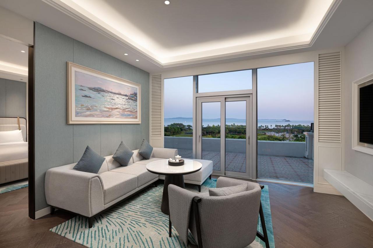 Xiamen International Seaside Hotel -Hotel Corridor Leads To The Stone Exhibition Hall Exterior photo