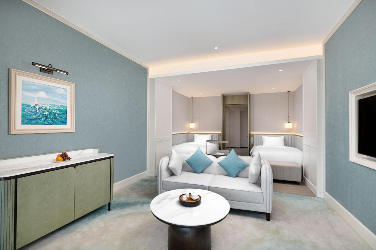 Xiamen International Seaside Hotel -Hotel Corridor Leads To The Stone Exhibition Hall Exterior photo