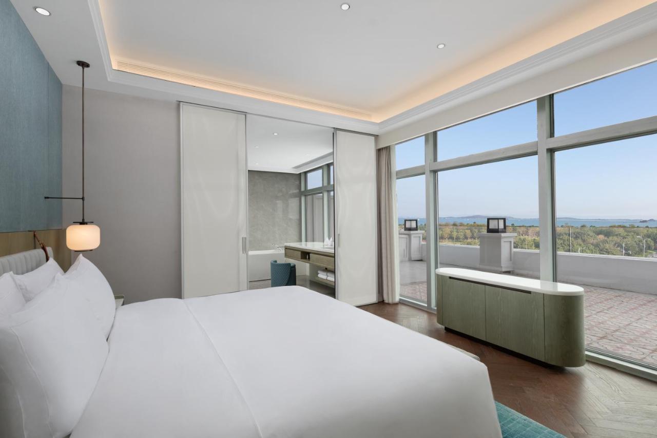 Xiamen International Seaside Hotel -Hotel Corridor Leads To The Stone Exhibition Hall Exterior photo