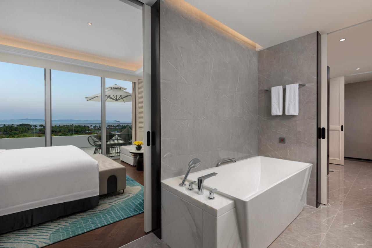 Xiamen International Seaside Hotel -Hotel Corridor Leads To The Stone Exhibition Hall Exterior photo