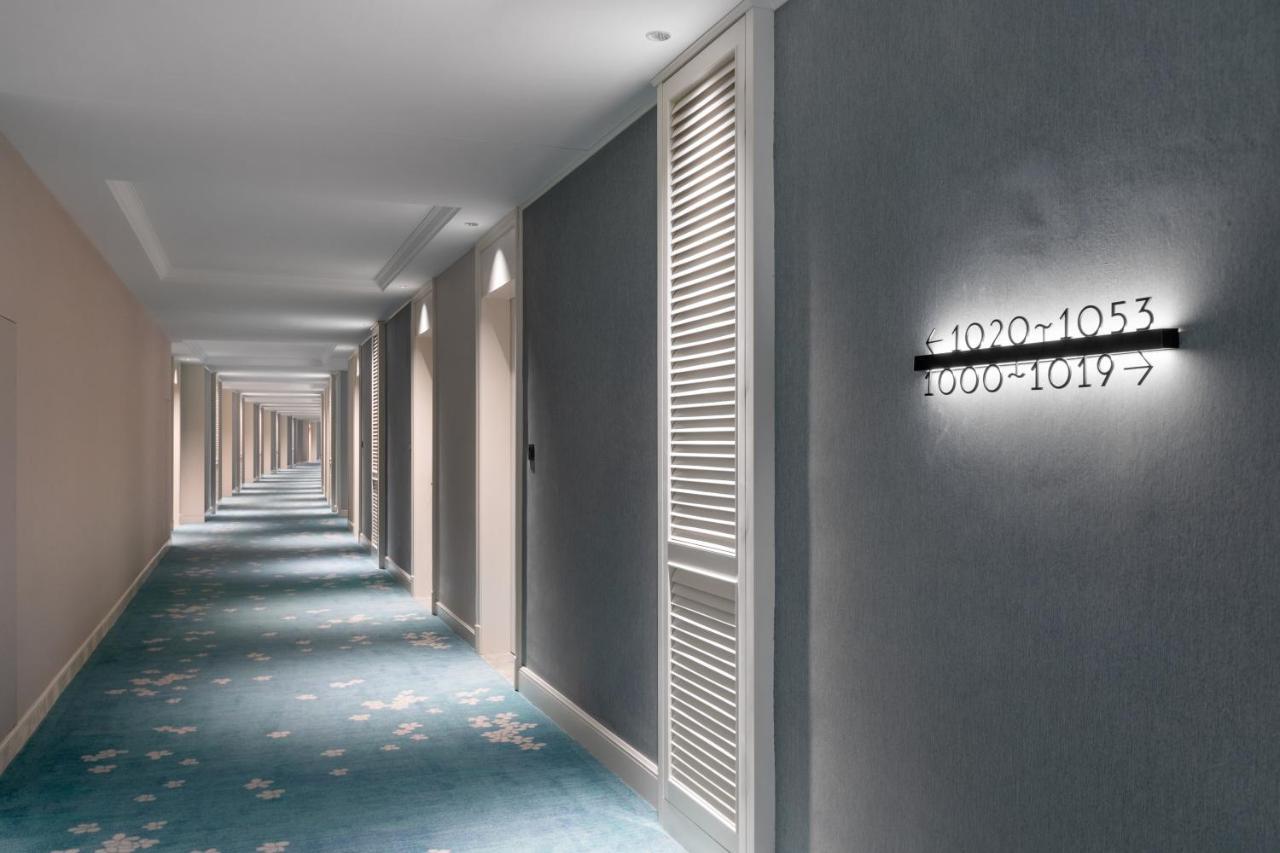 Xiamen International Seaside Hotel -Hotel Corridor Leads To The Stone Exhibition Hall Exterior photo