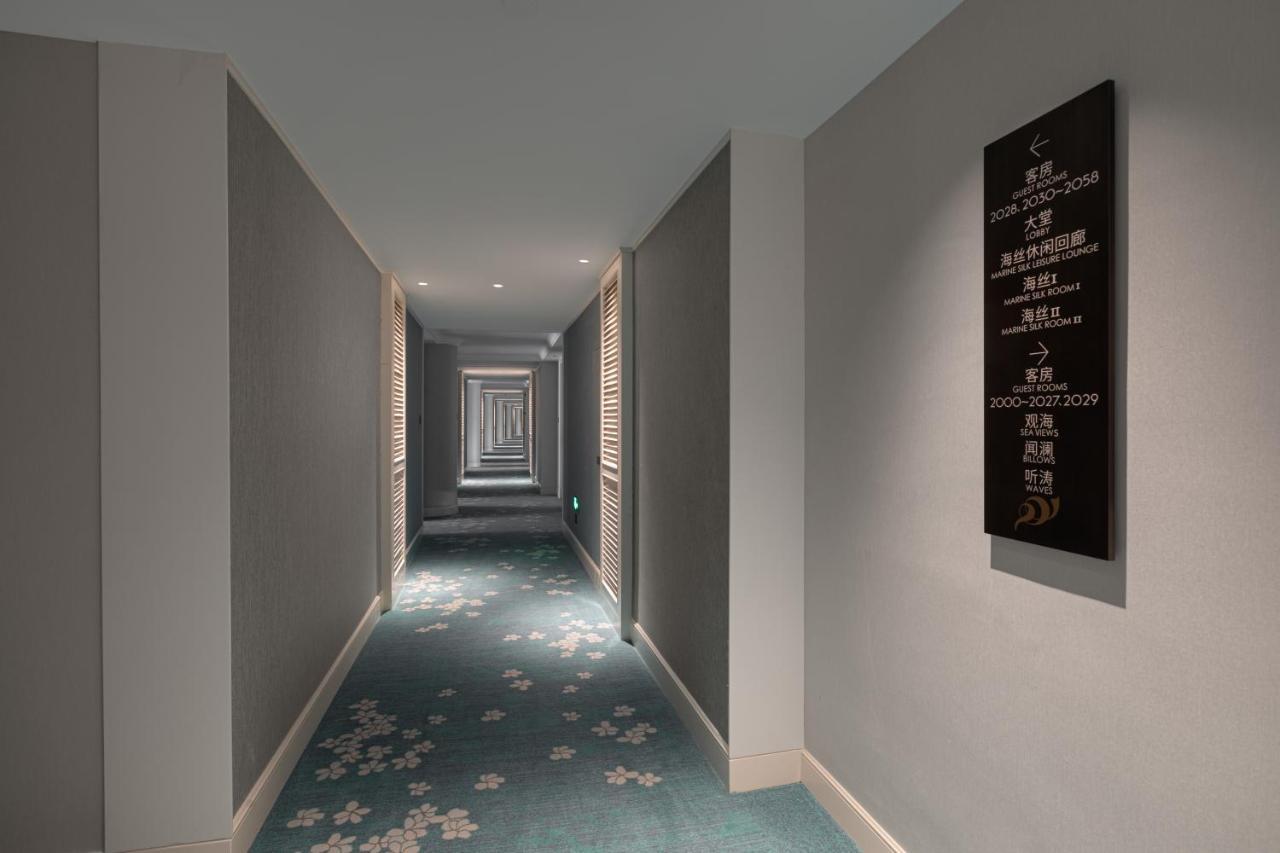 Xiamen International Seaside Hotel -Hotel Corridor Leads To The Stone Exhibition Hall Exterior photo