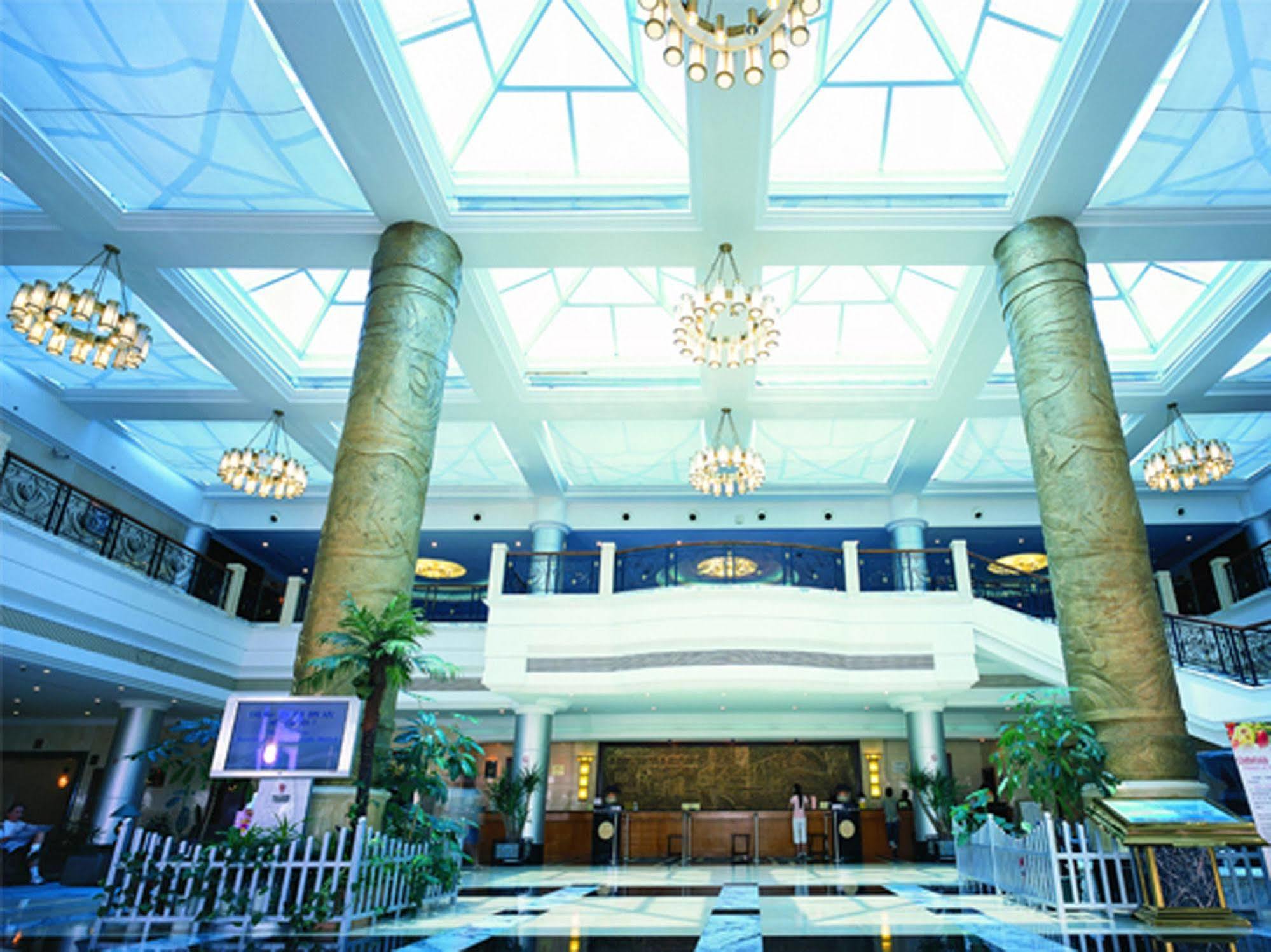 Xiamen International Seaside Hotel -Hotel Corridor Leads To The Stone Exhibition Hall Exterior photo